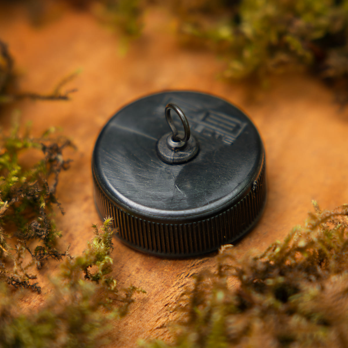 PB Products Buoy Big Eye Swivel Bottle Cap, side view